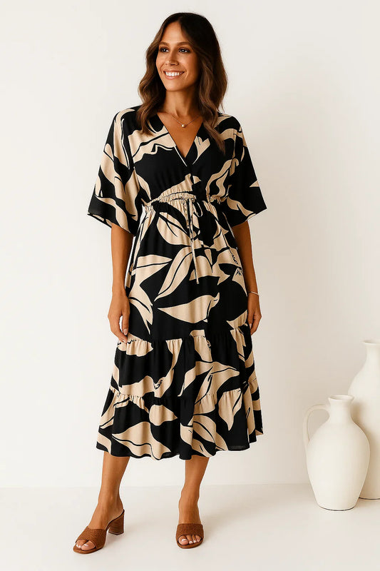 Lovaé™ | V-ringet elegant kjole med trekvartærmer og snøre